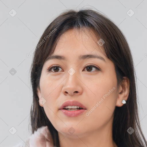 Joyful white young-adult female with medium  brown hair and brown eyes