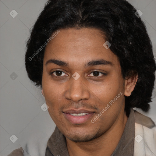 Joyful black young-adult male with short  brown hair and brown eyes