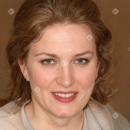 Joyful white young-adult female with medium  brown hair and blue eyes