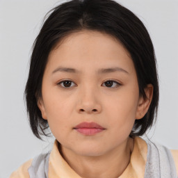 Neutral asian young-adult female with medium  brown hair and brown eyes