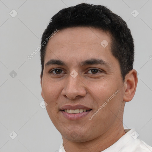 Joyful white young-adult male with short  black hair and brown eyes