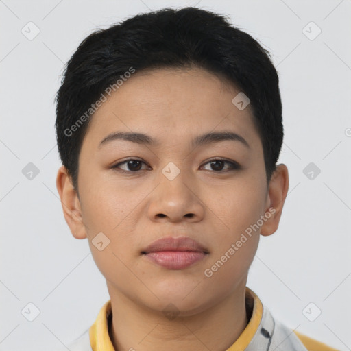 Joyful latino young-adult female with short  black hair and brown eyes