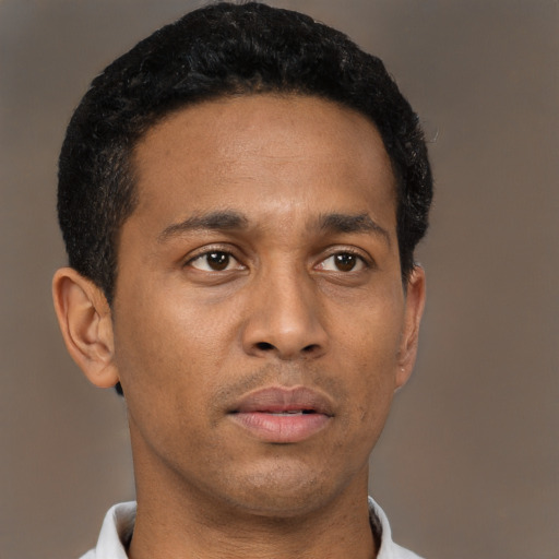Neutral latino young-adult male with short  brown hair and brown eyes
