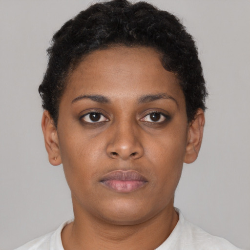 Neutral black young-adult female with short  brown hair and brown eyes