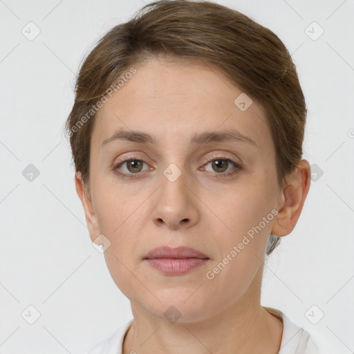 Neutral white young-adult female with short  brown hair and grey eyes