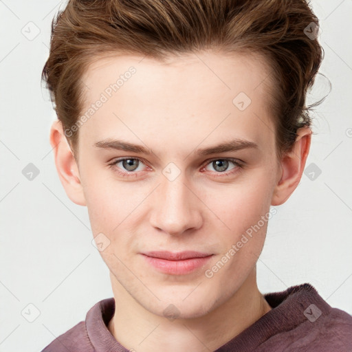 Joyful white young-adult male with short  brown hair and blue eyes