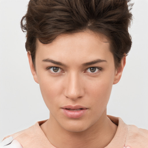 Neutral white young-adult female with short  brown hair and brown eyes