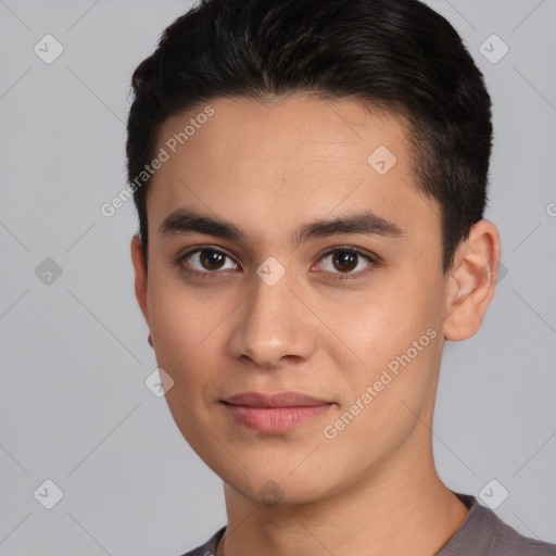 Joyful white young-adult male with short  black hair and brown eyes