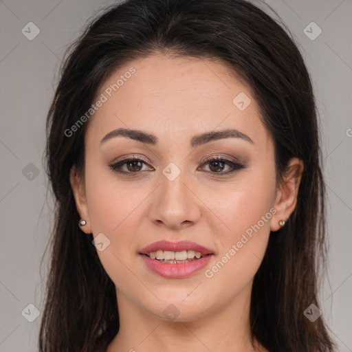 Joyful white young-adult female with long  brown hair and brown eyes