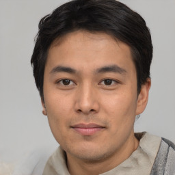 Neutral asian young-adult male with short  black hair and brown eyes