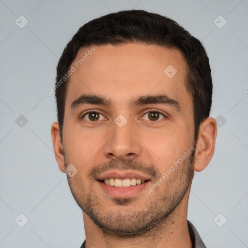 Joyful white young-adult male with short  brown hair and brown eyes