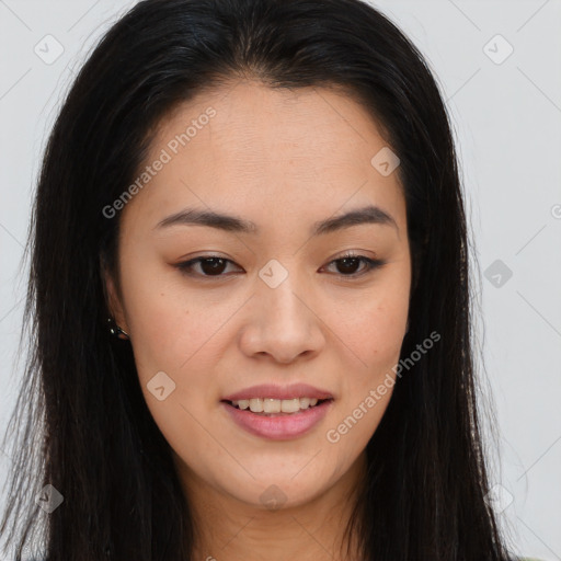 Joyful asian young-adult female with long  brown hair and brown eyes