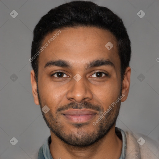 Joyful black young-adult male with short  brown hair and brown eyes