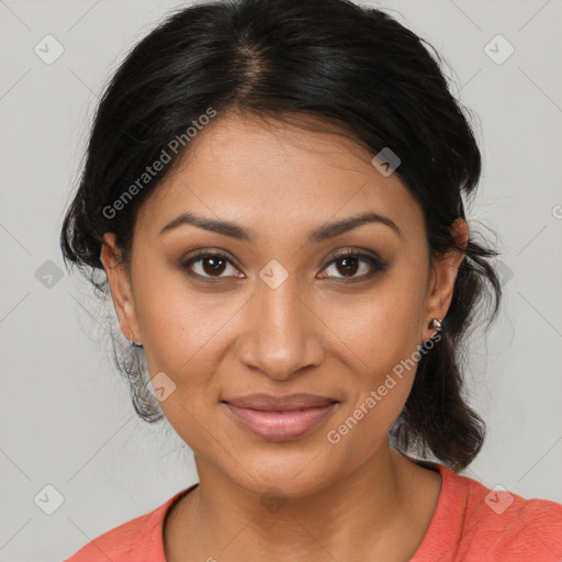 Joyful latino young-adult female with medium  brown hair and brown eyes