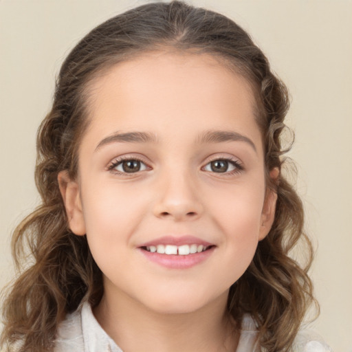 Joyful white child female with medium  brown hair and brown eyes