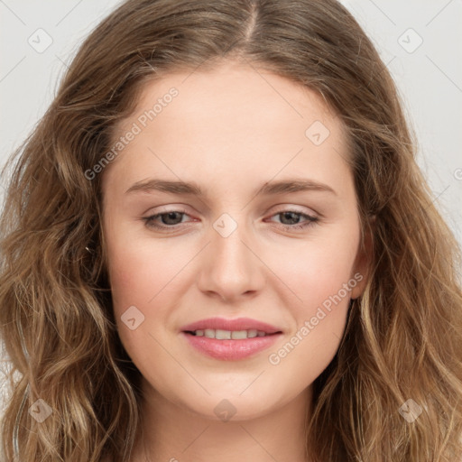 Joyful white young-adult female with long  brown hair and green eyes