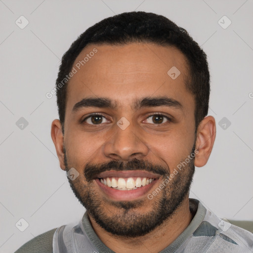 Joyful latino young-adult male with short  black hair and brown eyes