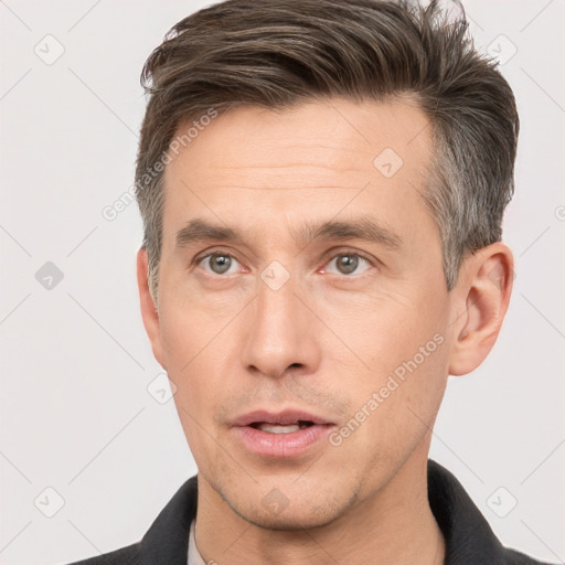 Neutral white adult male with short  brown hair and brown eyes