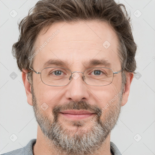 Joyful white adult male with short  brown hair and grey eyes