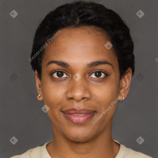 Joyful black young-adult female with short  black hair and brown eyes