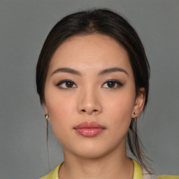 Neutral asian young-adult female with medium  brown hair and brown eyes