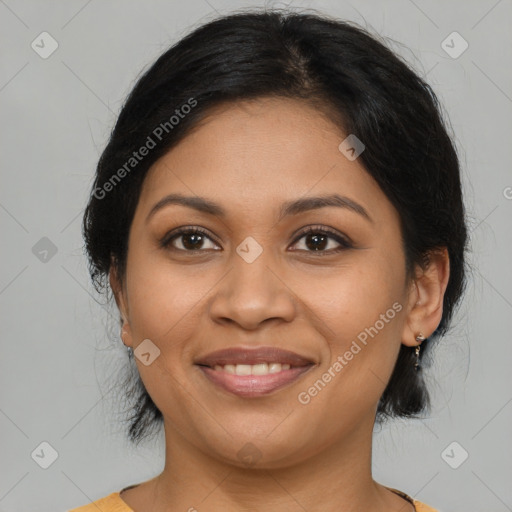 Joyful latino young-adult female with medium  brown hair and brown eyes