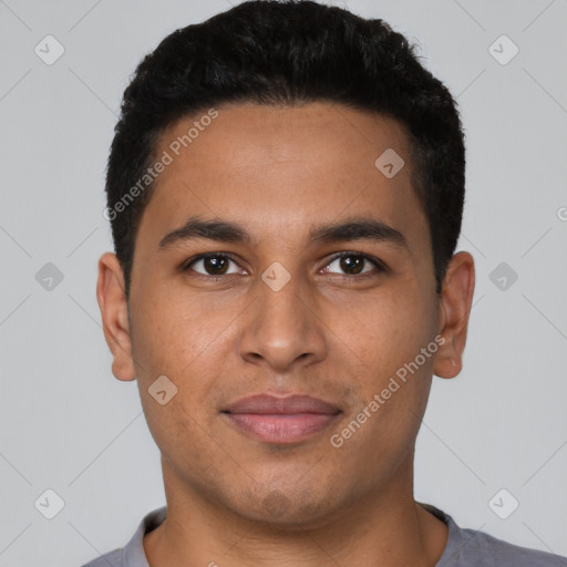 Joyful latino young-adult male with short  black hair and brown eyes