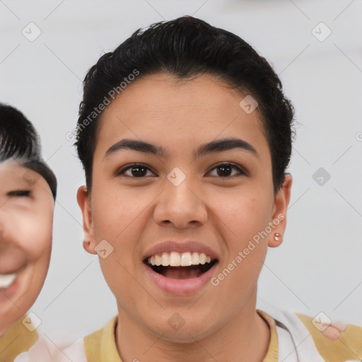 Joyful asian young-adult female with short  brown hair and brown eyes