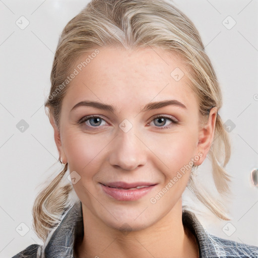 Joyful white young-adult female with medium  brown hair and blue eyes