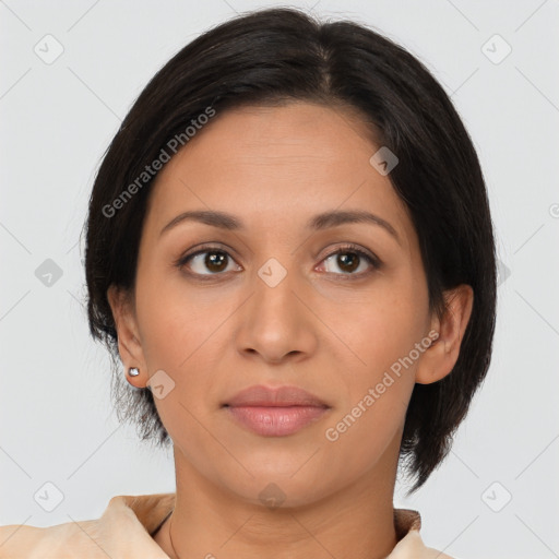 Joyful latino young-adult female with medium  brown hair and brown eyes