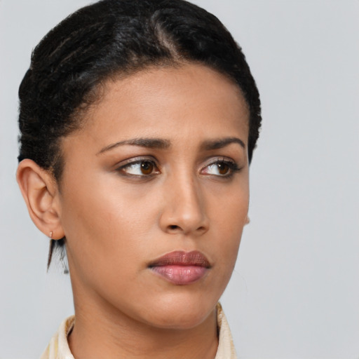 Neutral black young-adult female with short  brown hair and brown eyes