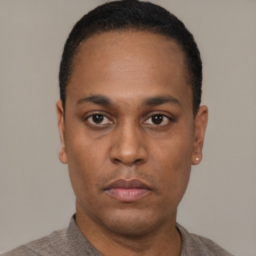 Neutral black young-adult male with short  black hair and brown eyes