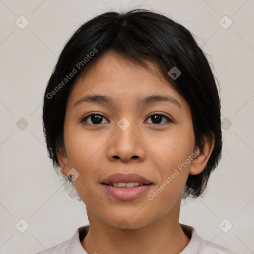 Joyful latino young-adult female with medium  brown hair and brown eyes