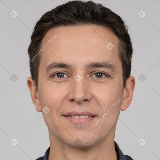 Joyful white young-adult male with short  brown hair and brown eyes