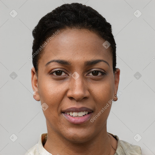 Joyful black young-adult female with short  black hair and brown eyes