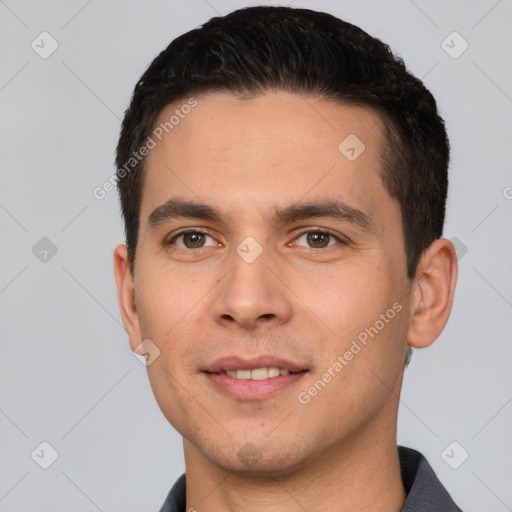 Joyful white young-adult male with short  black hair and brown eyes