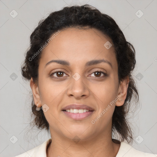 Joyful latino young-adult female with medium  brown hair and brown eyes