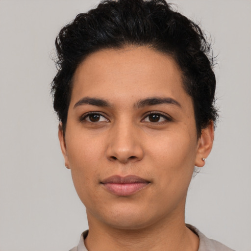 Neutral latino young-adult female with short  black hair and brown eyes