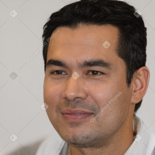 Joyful white young-adult male with short  black hair and brown eyes