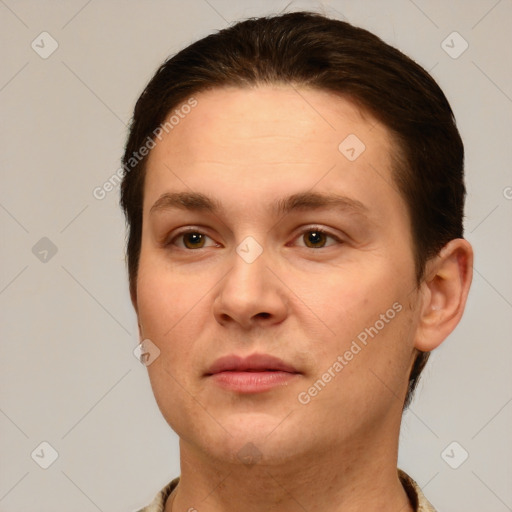 Joyful white young-adult female with short  brown hair and brown eyes