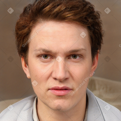 Joyful white adult male with short  brown hair and grey eyes