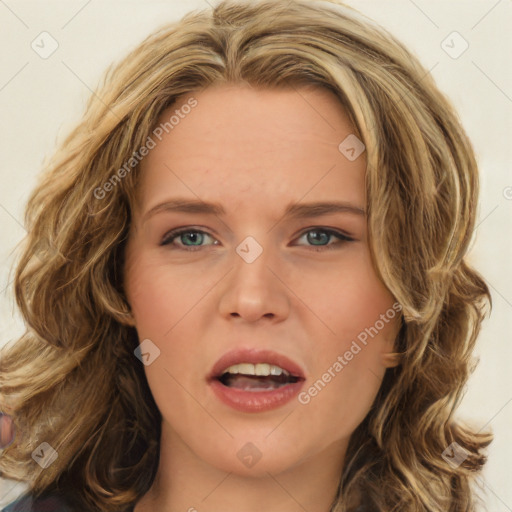 Joyful white young-adult female with long  brown hair and green eyes