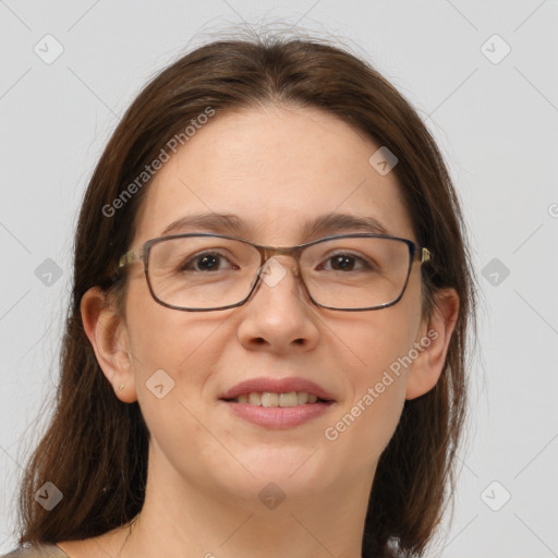 Joyful white adult female with medium  brown hair and grey eyes