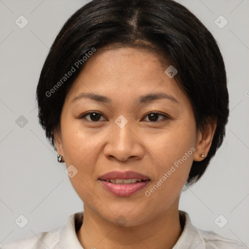 Joyful white adult female with medium  brown hair and brown eyes