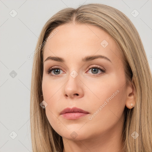 Neutral white young-adult female with long  brown hair and brown eyes