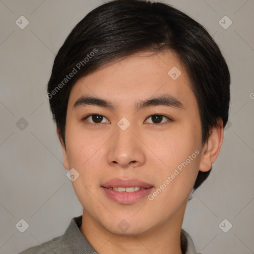 Joyful asian young-adult male with short  brown hair and brown eyes