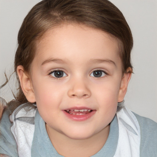 Joyful white child female with medium  brown hair and brown eyes