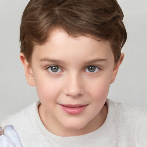 Joyful white child female with short  brown hair and grey eyes