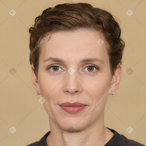 Joyful white adult female with short  brown hair and brown eyes