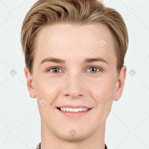 Joyful white young-adult female with short  brown hair and grey eyes